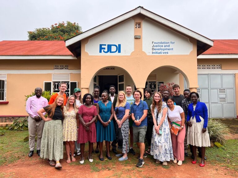 Image of USask students with local staff in Uganda, 2023